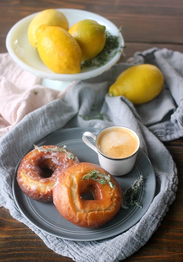 Lemon Thyme Old Fashioned Donuts are made with lots of egg yolks and sour cream and fried at a lower temperature to help get that crackly donut top! They are tangy, herbacious, slightly sweet, and so good with a strong cup of coffee! Lemon Thyme Old Fashioned Donuts are made with lots of egg yolks and sour cream and fried at a lower temperature to help get that crackly donut top! They are tangy, herbacious, slightly sweet, and so good with a strong cup of coffee!
