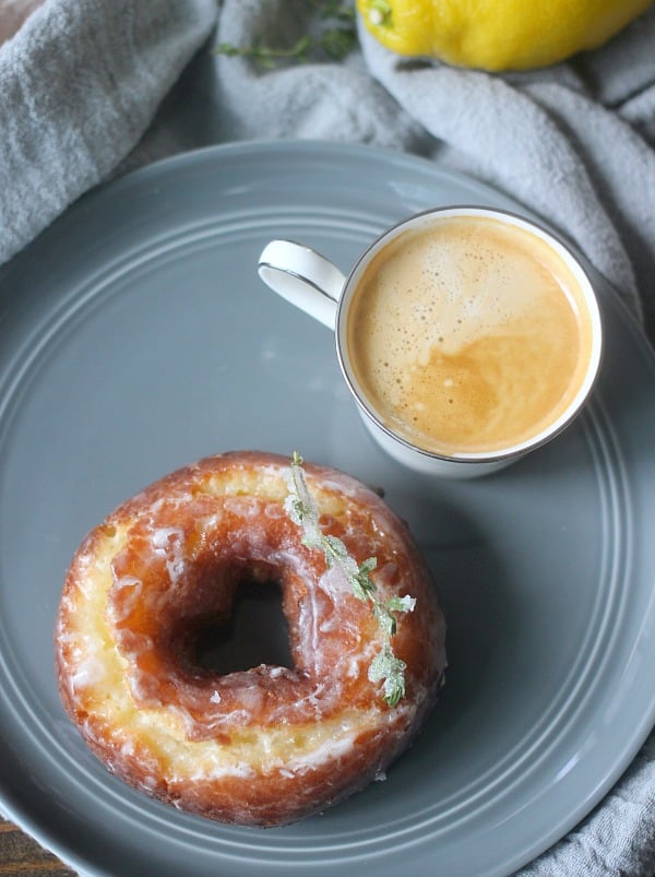 Lemon Thyme Old Fashioned Donuts are made with lots of egg yolks and sour cream and fried at a lower temperature to help get that crackly donut top! They are tangy, herbacious, slightly sweet, and so good with a strong cup of coffee! Lemon Thyme Old Fashioned Donuts are made with lots of egg yolks and sour cream and fried at a lower temperature to help get that crackly donut top! They are tangy, herbacious, slightly sweet, and so good with a strong cup of coffee!
