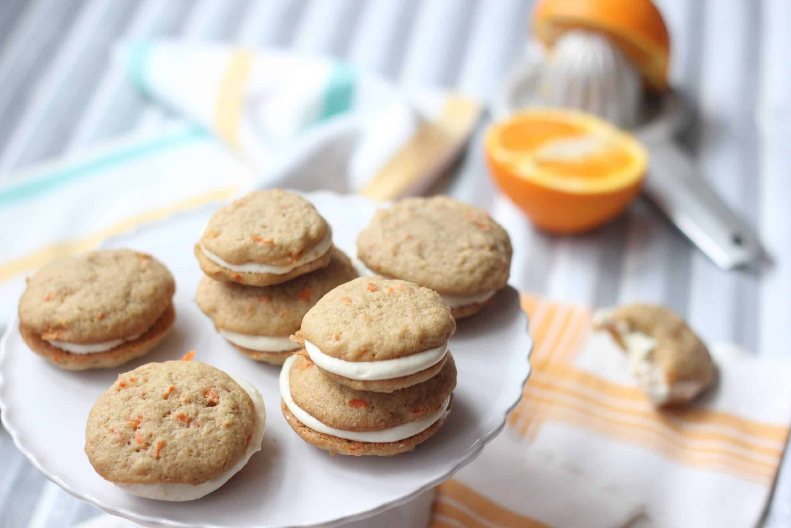Carrot Cake Whoopie Pies on a cake stand