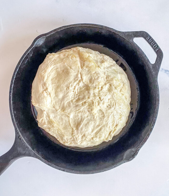 dough poured out into skillet