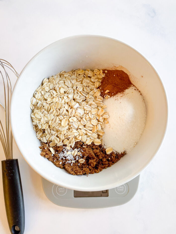 oat streusel being mixed in a bowl