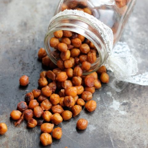 Sweet and Savory Roasted Chickpeas/Garbanzo Beans pouring out of a mason jar