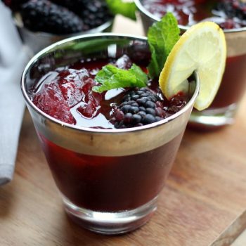 Bourbon Blackberry Mint Lemonade in glasses garnished with whole blackberries and mint leaves
