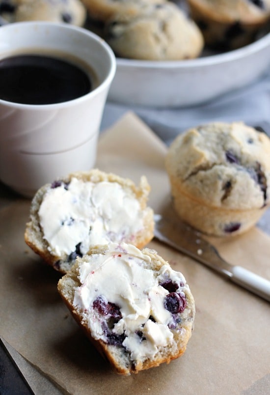A blueberry muffin slathered with butter