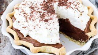 Chocolate French Silk Pie with a slice taken out