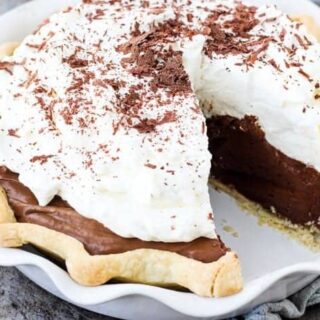 Chocolate French Silk Pie with a slice taken out