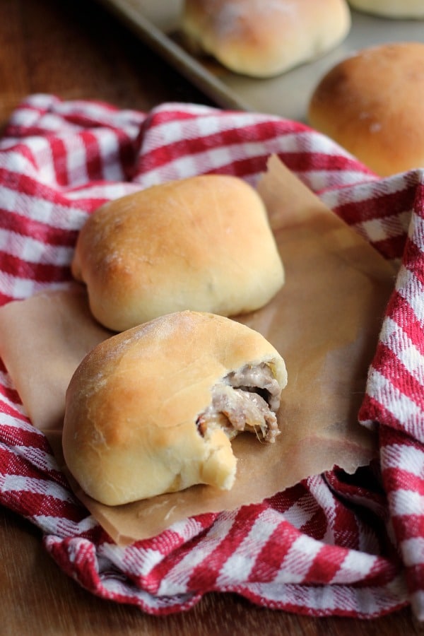 2 rolls stuffed with Philly cheesesteak filling