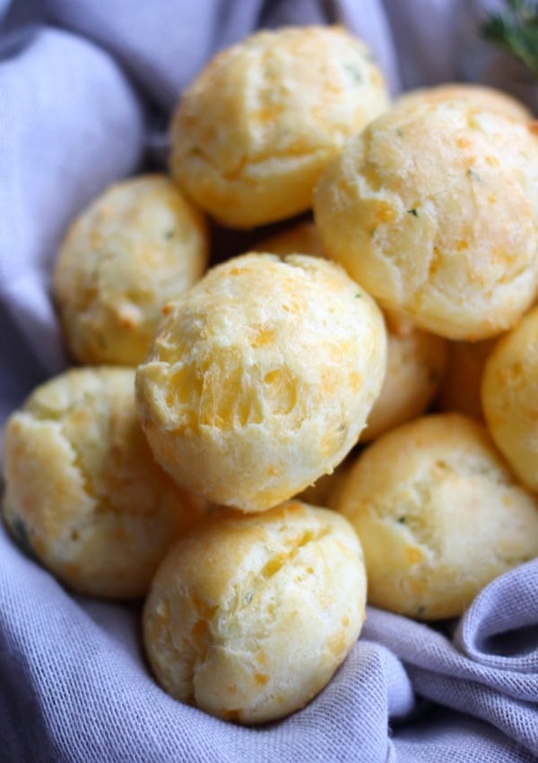 Sharp Cheddar and Thyme Cheese Puffs (Gougère) on a cloth