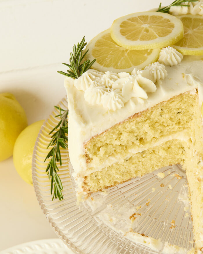 lemon layer cake with a slice taken out