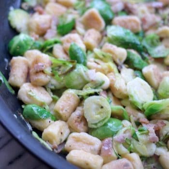 Parisienne Herb Gnocchi with Bacon and Brussels Sprouts in a pan