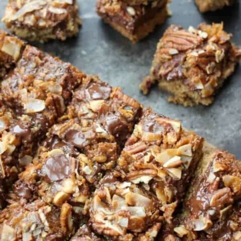 Dark Chocolate Magic Bars with Whiskey Caramel Sauce cut into squares