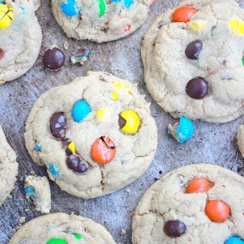 Thick and Soft Peanut Butter M&M Cookies on a sheet pan