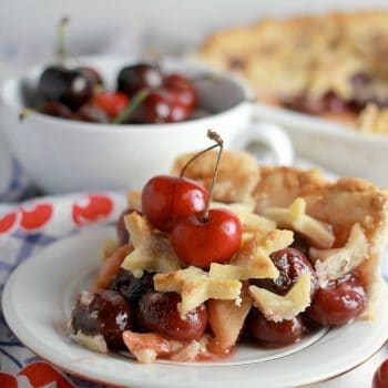 A slice of cherry apple pie