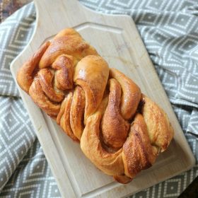 Braided Cinnamon Sugar Loaf on a cutting board