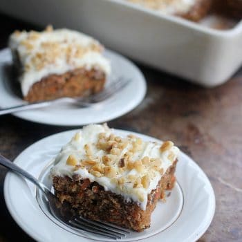 A slice of Classic Carrot Cake with Cream Cheese Frosting