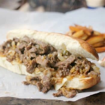 Philly Cheesesteak sandwich and fries