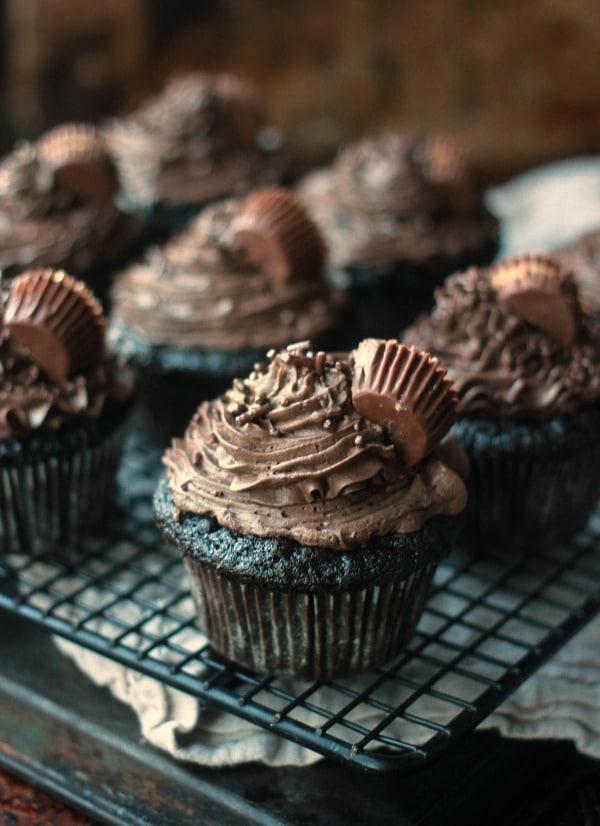 https://bakerbettie.com/wp-content/uploads/2014/10/dark-chocolate-cupcakes-peanut-butter-cups.jpg