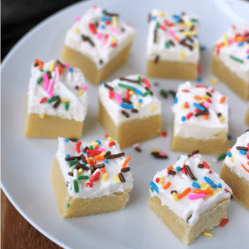 Mini Soft Sugar Cookie Bars cut into squares and topped with colorful sprinkles