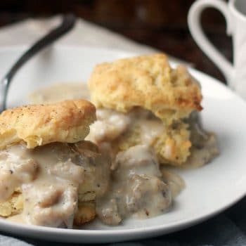 Plate of lard biscuits with sausage gravy