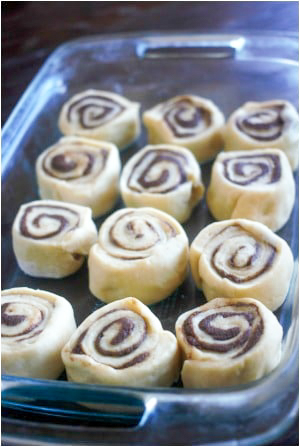 unbaked cinnamon rolls in a pan