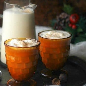 Eggnog in pretty glasses on a tray