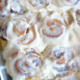 Cinnamon Rolls covered in cream cheese frosting