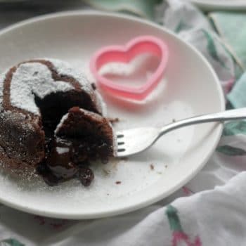 Molten Chocolate Lava Cake with bite taken out with a fork