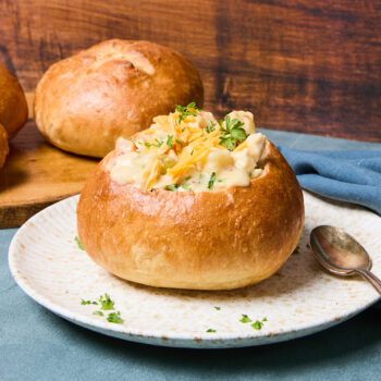 Sourdough bread bowl filled with chicken soup