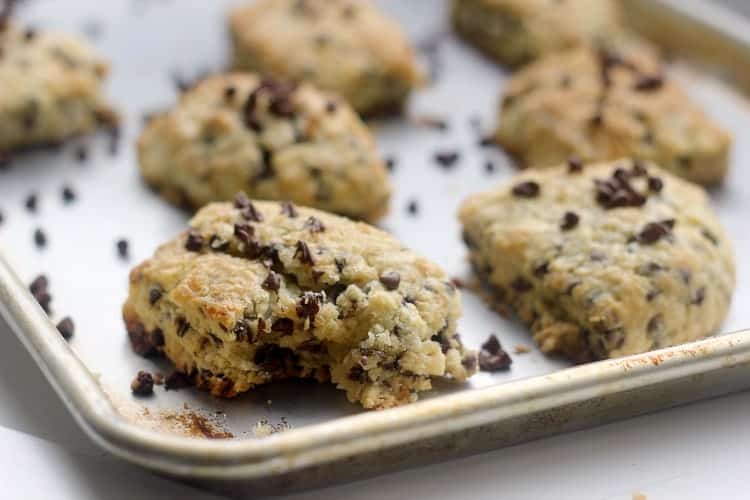 The instruction to "cut in fat" is a common instruction in baking recipes. The process of cutting in fat is very simple and a necessary skill for beautiful flaky and tender baked goods such as biscuits, scones, pie and pastry crusts. Chocolate Chip Scones on a sheet pan