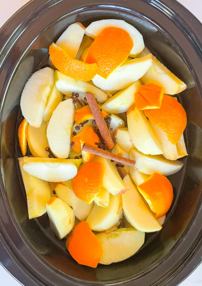 apple cider with the whole fruit in a crock-pot before cooking