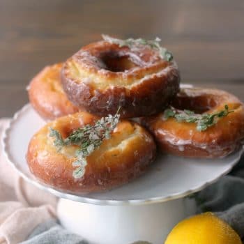 Lemon Thyme Old Fashioned Donuts on a cake stand