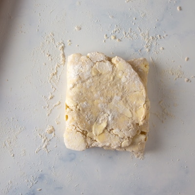 Dough rotated 90 degrees before being rolled out again