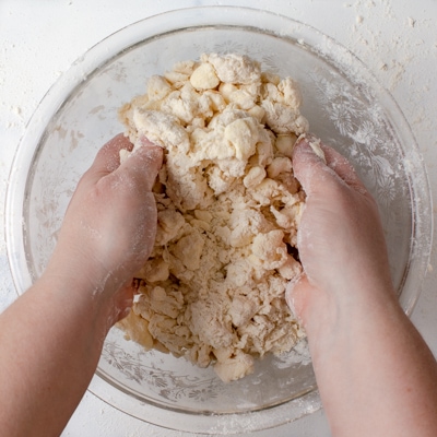 Clumpy mixture of quick puff pastry after the water has been mixed in