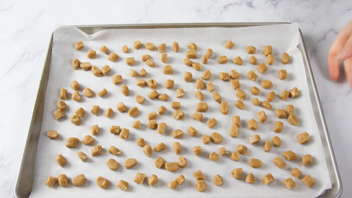 Peppernuts on baking sheet ready to go into the oven