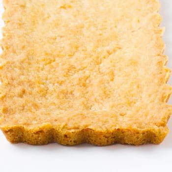 Baked shortbread crust, sable breton, to use for tarts, cheesecake, and cookie bars.
