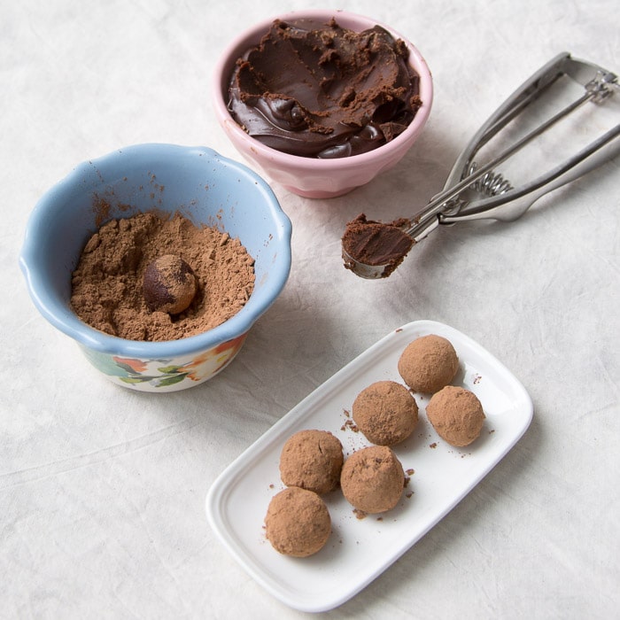 Chocolate truffles being made with chocolate ganache