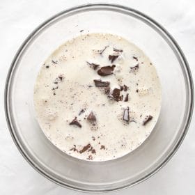 Hot cream poured over chopped chocolate
