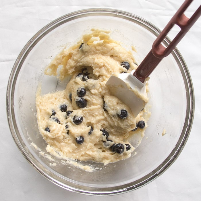 Blueberries being folded into batter