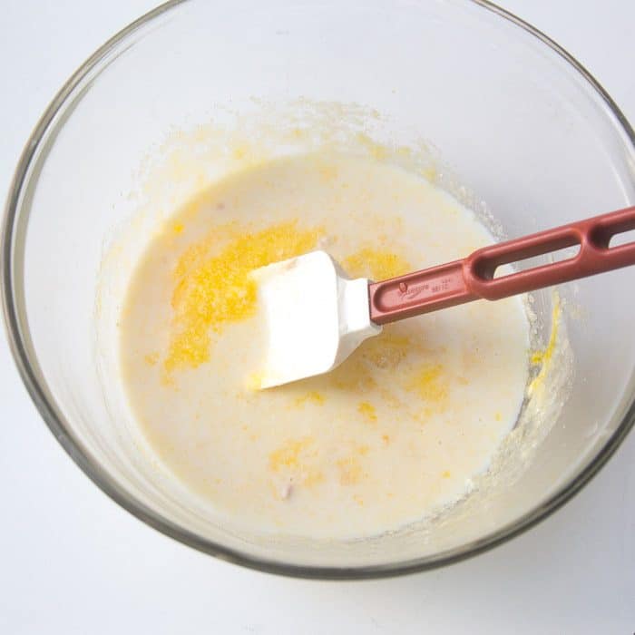 The milk and yeast added to the bowl