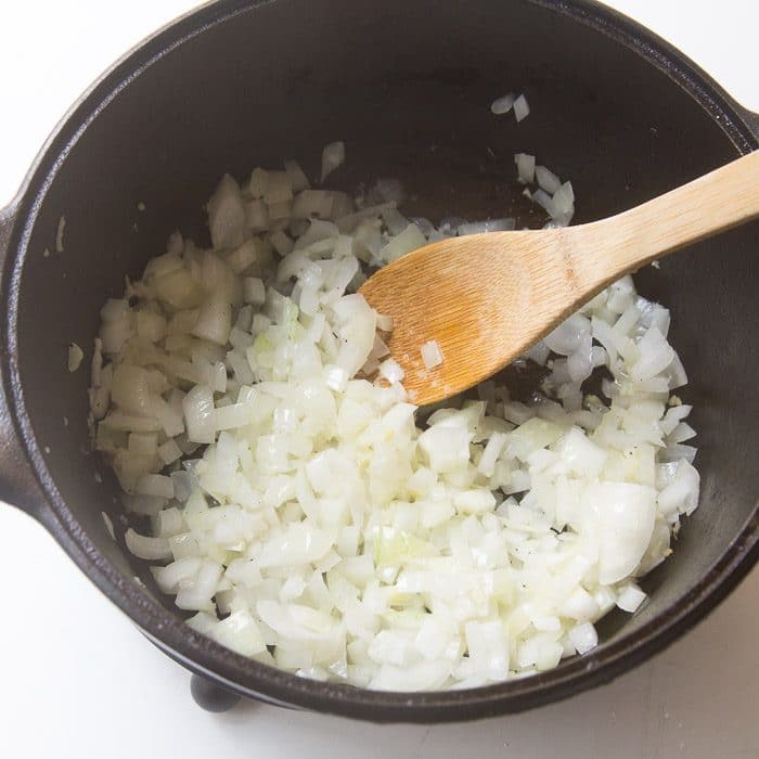 Sauteing the onions and garlic in a pan