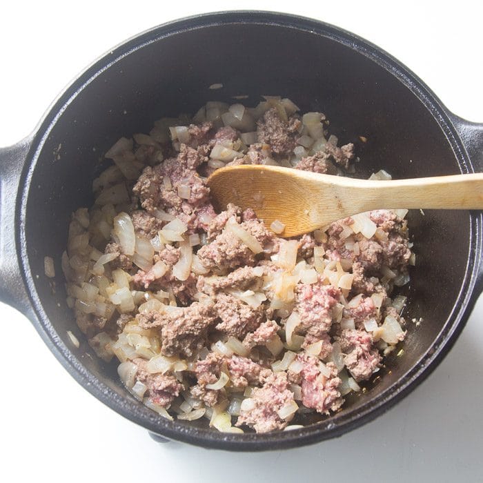 Browning the ground beef with the onions and garlic