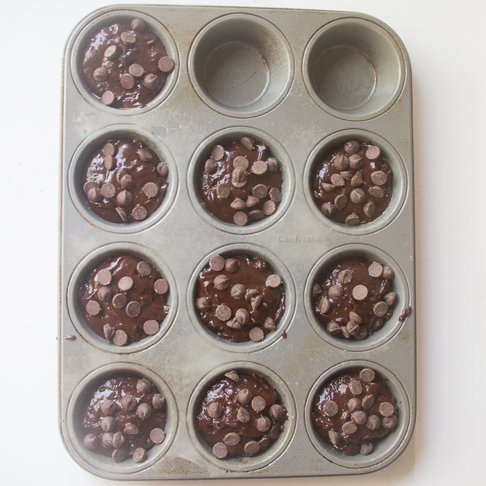 Muffin batter in muffin cups