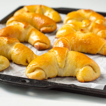 Golden crescent rolls on a tray
