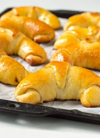 Golden crescent rolls on a tray
