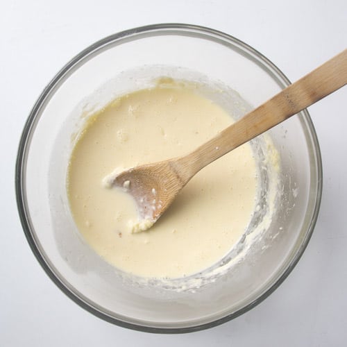 Milk stirred into butter/sugar/egg mixture