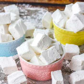 Fluffy square homemade marshmallows in various bowls
