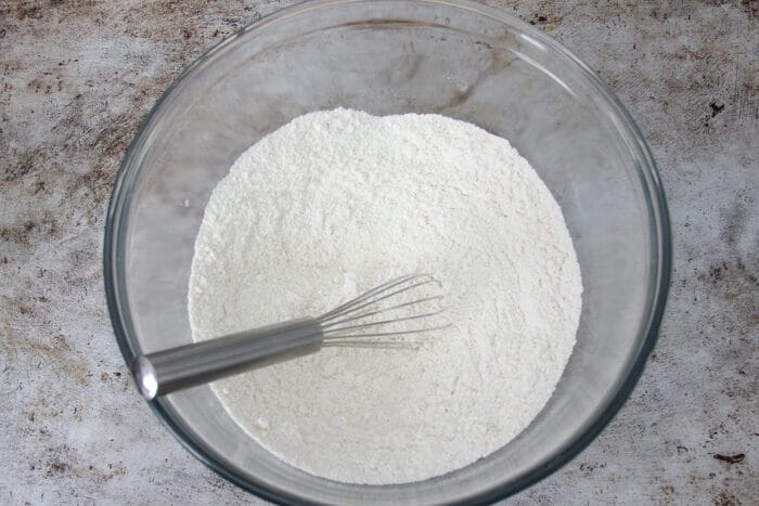 Dry ingredients for blueberry bread in a bowl after being mixed