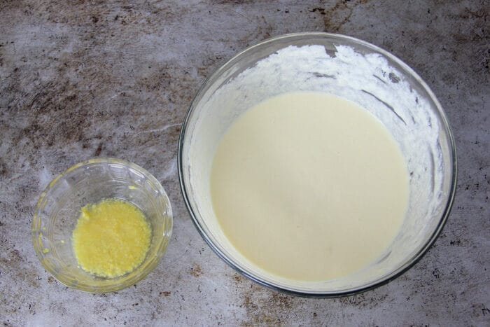 Wet ingredients in the bowl after being mixed for blueberry bread