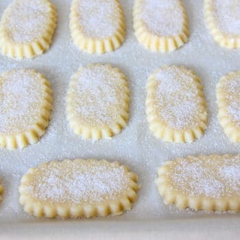 Shortbread cookies sprinkled with granulated sugar about to be baked