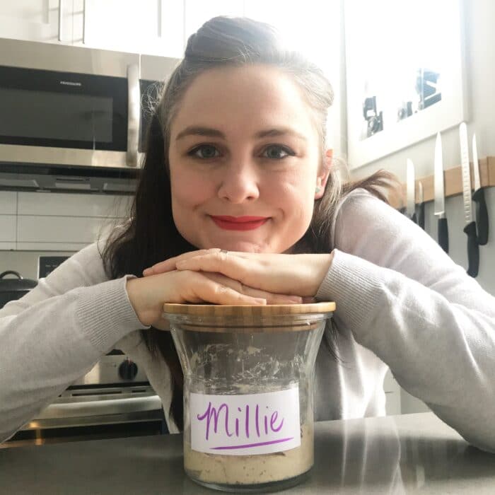 Bettie posing with your jar of sourdough starter named "Millie" 